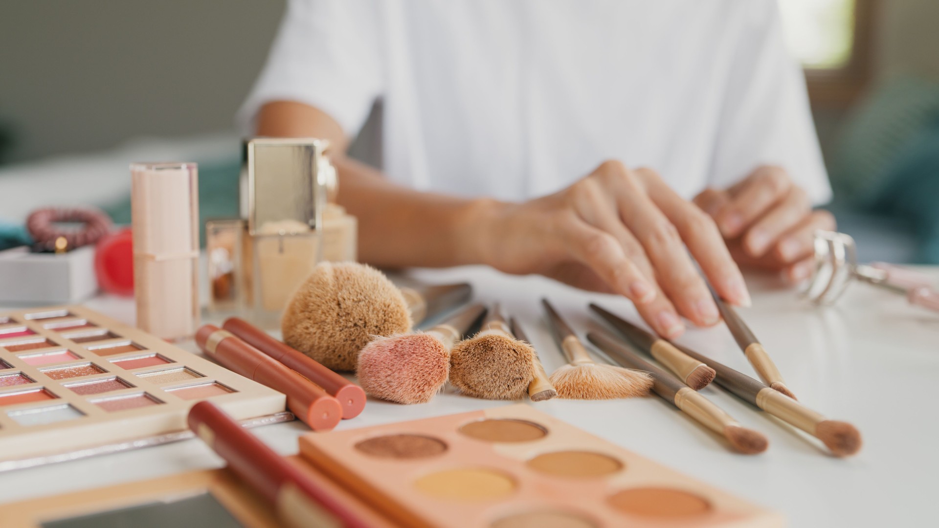 Close-up Cosmetic, Eye shadow palette, Lipstick, Foundation, Young Asian beauty girl collect makeup brush set. Lifestyle and people, Make up Natural look, Skin Care Cosmetics, Morning routine.