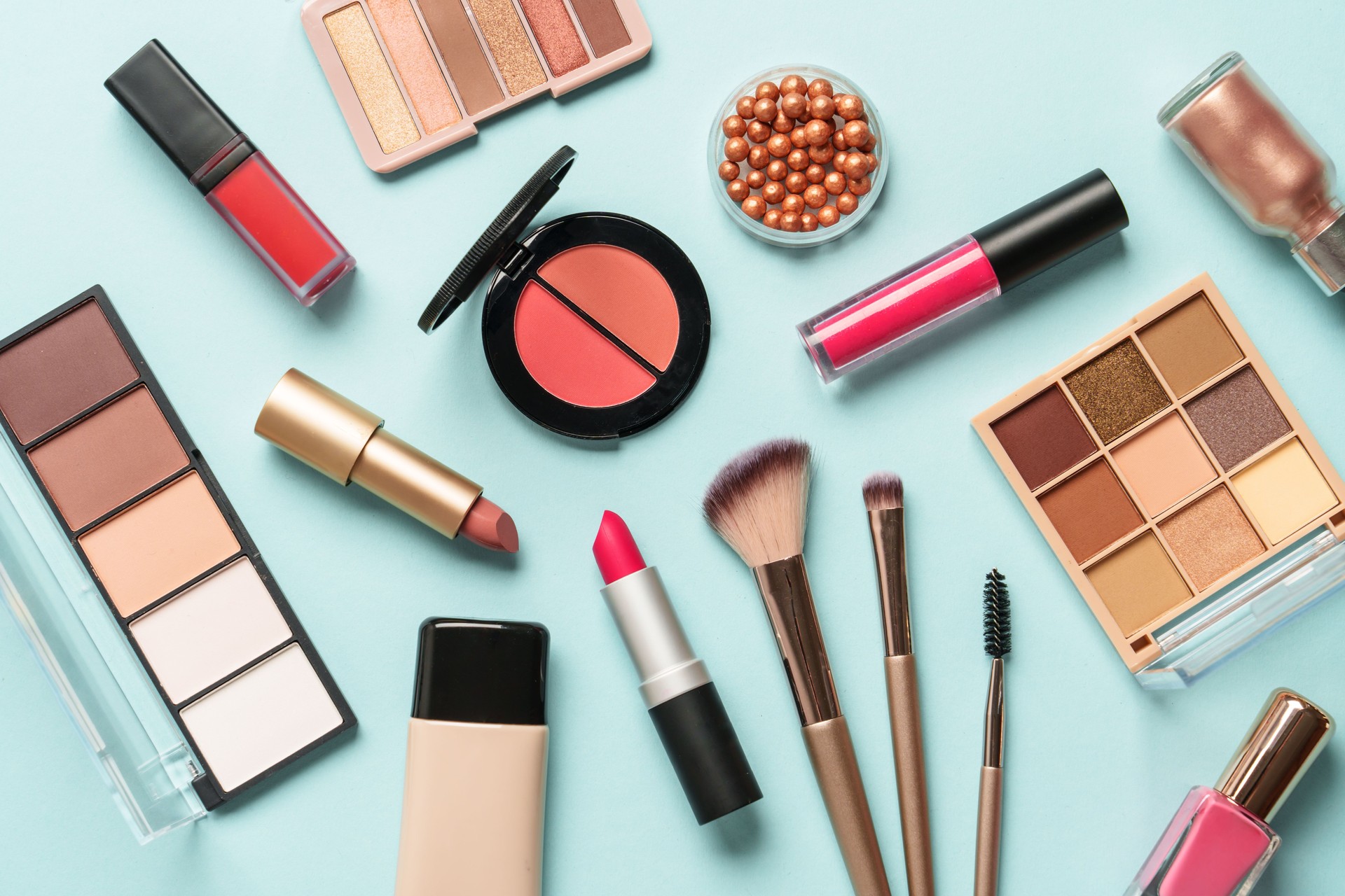 Beauty products on blue background.